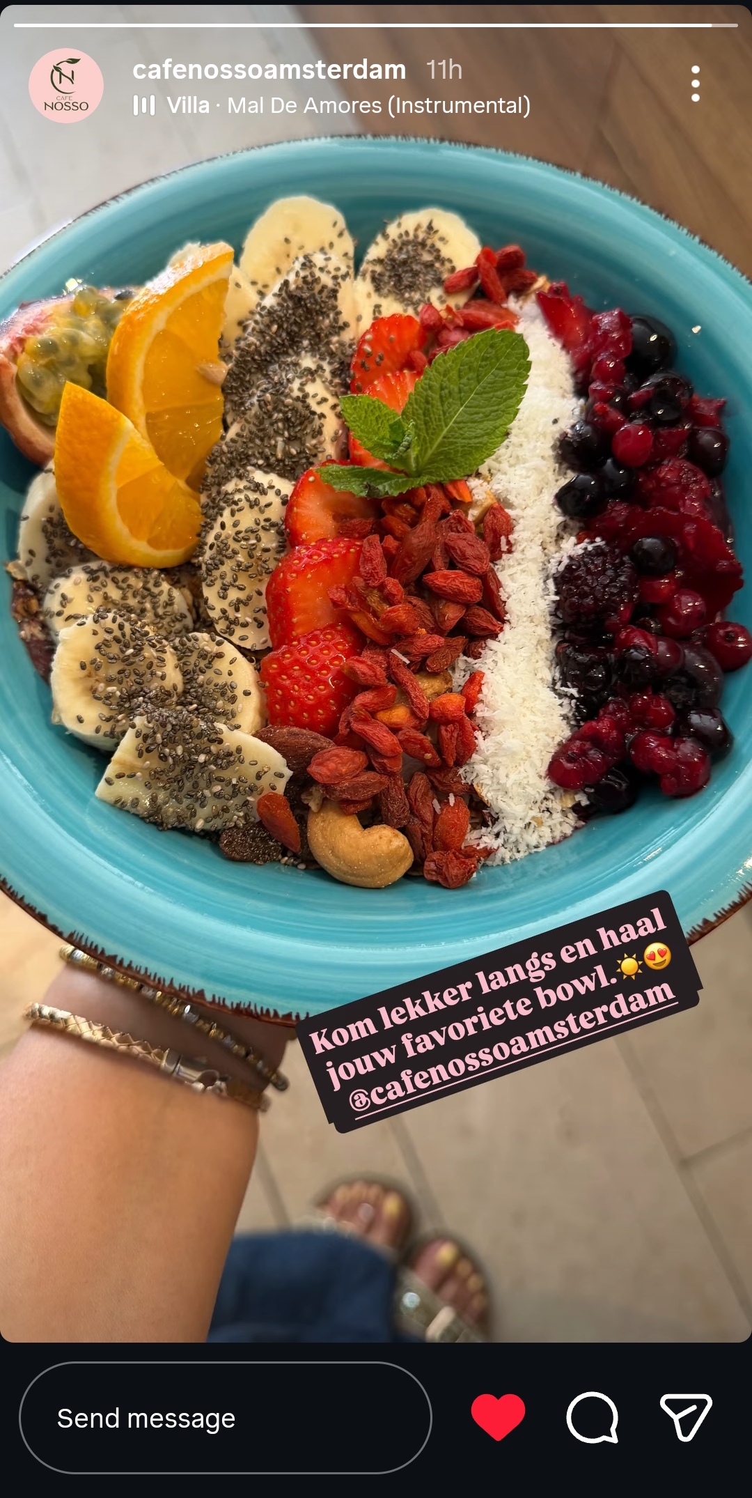 Açaí bowl with banana, berries, coconut and fruit